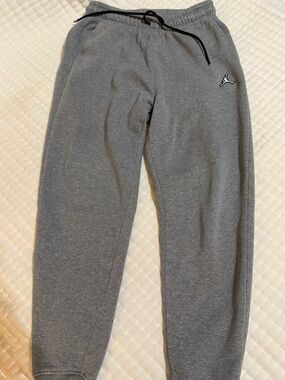 Nike Jordan Gray Jogger Sweatpants with Black Drawstring and Iconic Jordan logo
